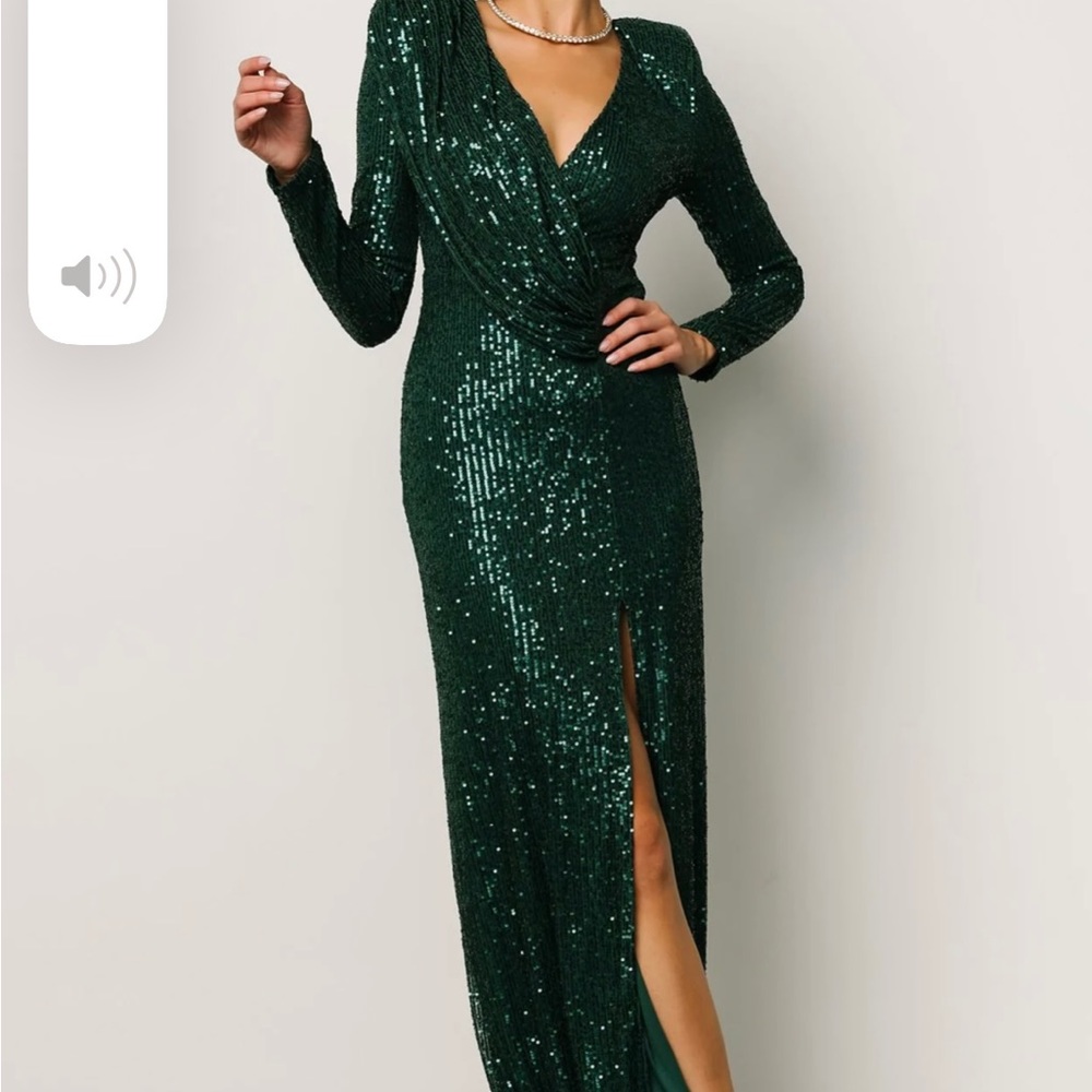 Green sequin long sleeve gown